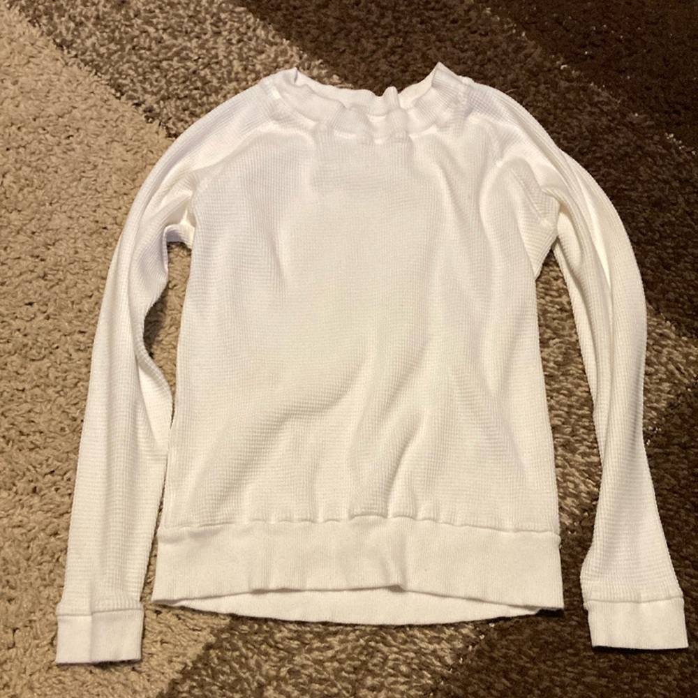 TNA white thicker shirt with a few marks.